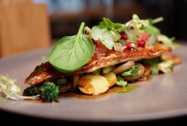 istock Fish fillet with vegetables and potatoes 651498192