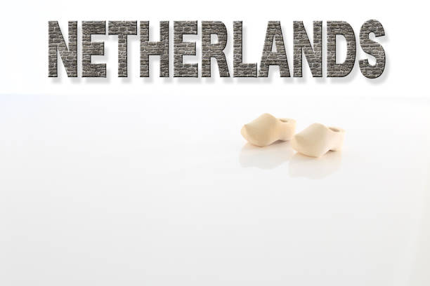 Netherlands Lettering with Dutch Wooden Shoes on White Background