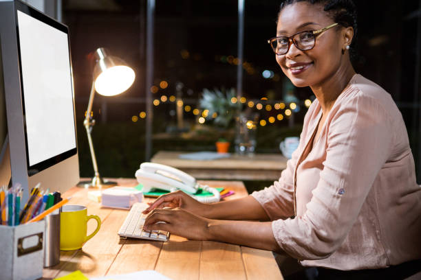istock Businesswoman working on computer at her desk 651569498