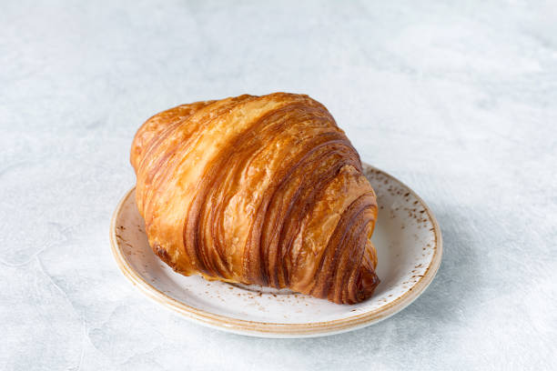 istock Croissant on a white plate 651593880