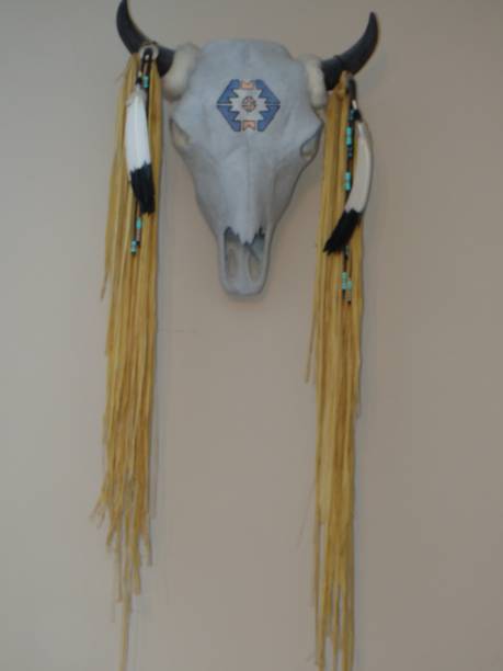 istock An Indian cattle head mounted on a wall in a New England Home mounted vertically vertically 651596486