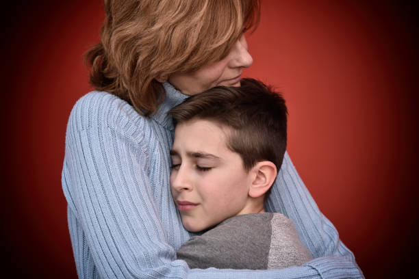 istock Young boy hugging his mother 651612508
