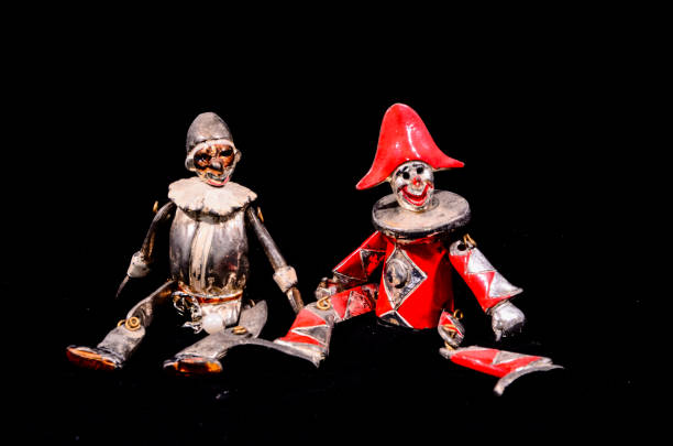 Pair of spooky skull jack in the box toys isolated on white, 3d render.
