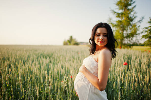 istock Pregnant gorgeous brunette woman 651638516