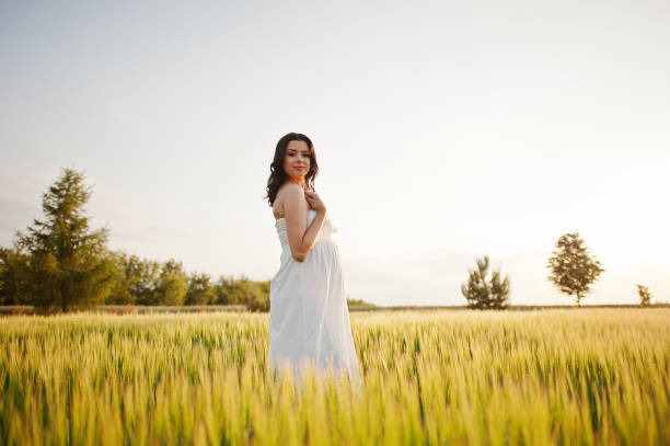 istock Pregnant gorgeous brunette woman 651638722