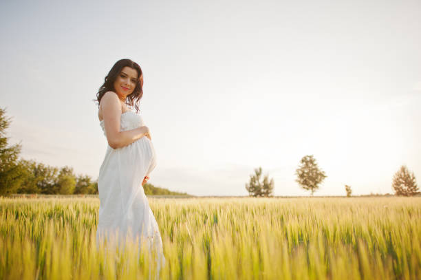 istock Pregnant gorgeous brunette woman 651638828