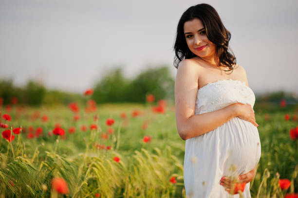 istock Pregnant gorgeous brunette woman 651639222