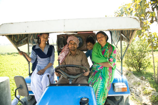 istock Indian family on tractor 651639862