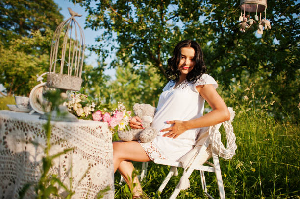 istock Pregnant gorgeous brunette woman 651641218