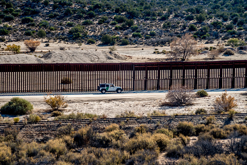 Border fence between Mexico and United States in the California desert near Jacumba.