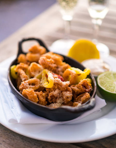 Fried calamari with sauce and lemon