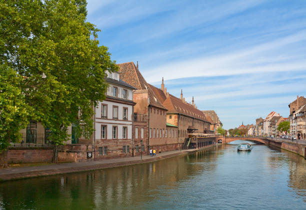 istock Strasbourg cityscape with River Ill, bridge and old buildings 651664586