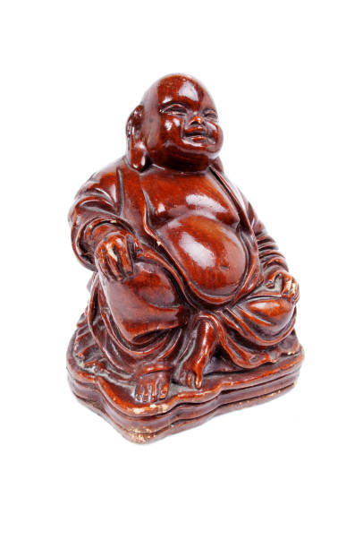 istock Brown old buddha made of wood 651713108