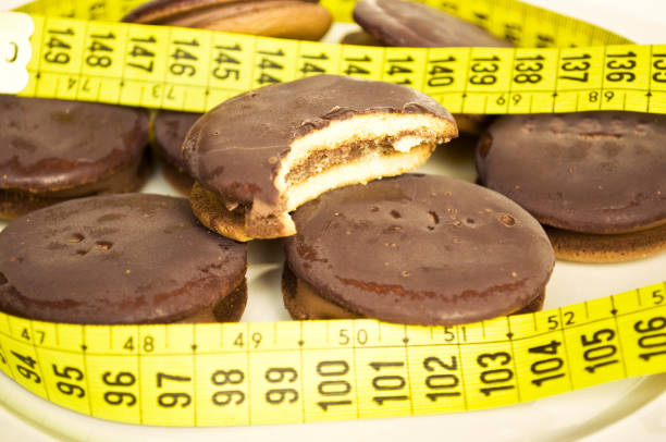 Chocolate cookies and measure tape