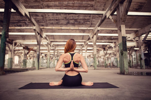 istock Woman doing yoga 651749652