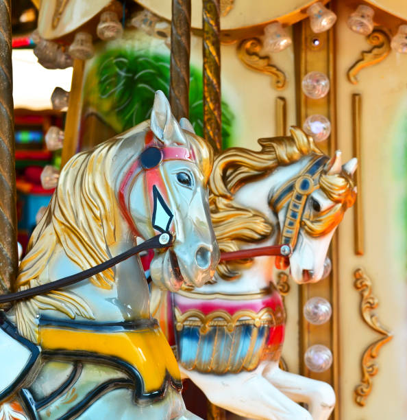 istock Carousel -  Fair conceptual background with horses 651753216