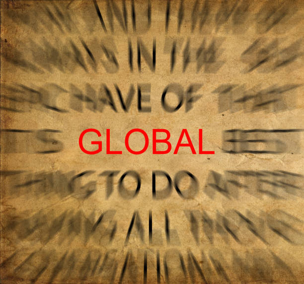 istock Blured text on vintage paper with focus on GLOBAL 651754516