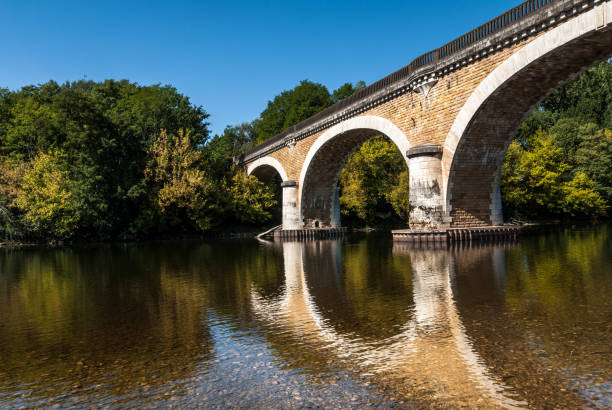istock Three Arched Stone Historic Bridge in France 651756862