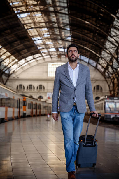 istock Businessman at the train station 651761978