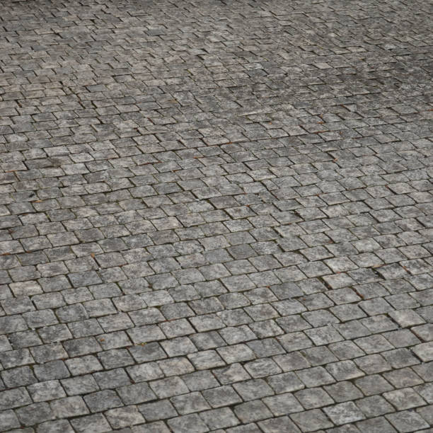 istock texture of cobblestone road, red square 651766344