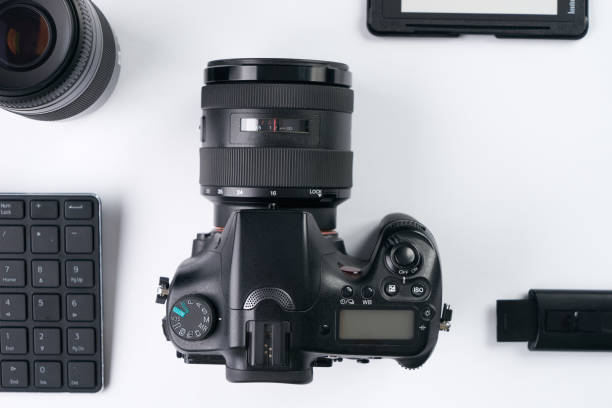 istock Top view of photographer  modern office desktop 651772196