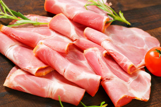 istock Slices of bacon with rosemary 651798104