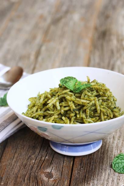 istock Healthy Mint Rice on wooden background, selective focus 651809774