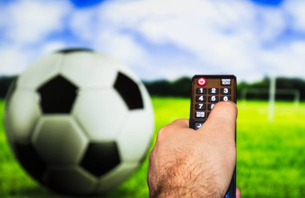 istock Football match and remote control 651848198