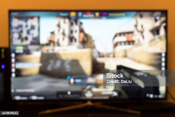 Counterstrike Professional Game On Tv And Remote Control Stock Photo - Download Image Now