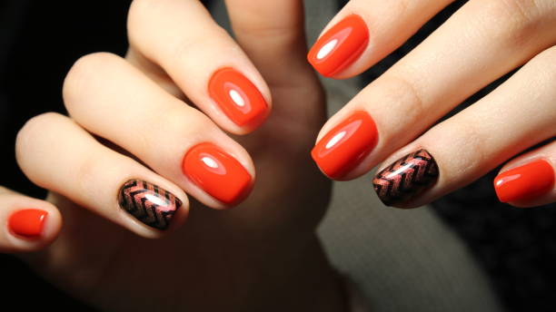 istock Elegant classic red manicure with shiny geometry 651873758