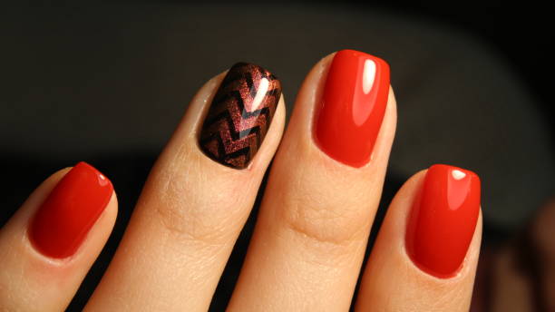 istock Elegant classic red manicure with shiny geometry 651882354