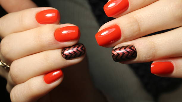 istock Elegant classic red manicure with shiny geometry 651889808