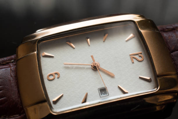 istock Golden Men's Wristwatch on A Black Background. 651984450