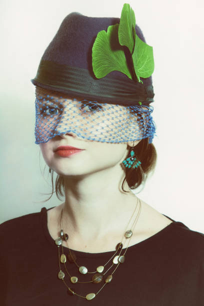 istock Girl wearing  hat with veil 651986246