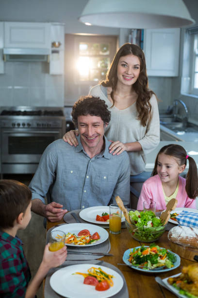 istock Happy family having breakfast 652031524