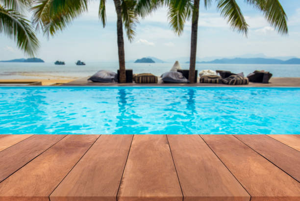 istock Blue swimming pool with summer vacation and wooden deck 652116134