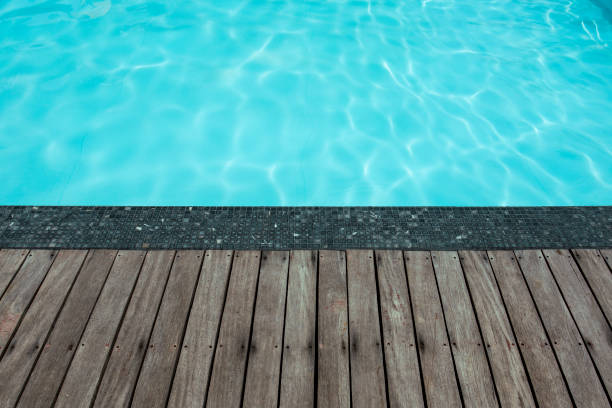 istock Blue swimming pool with summer vacation and wooden deck 652116206