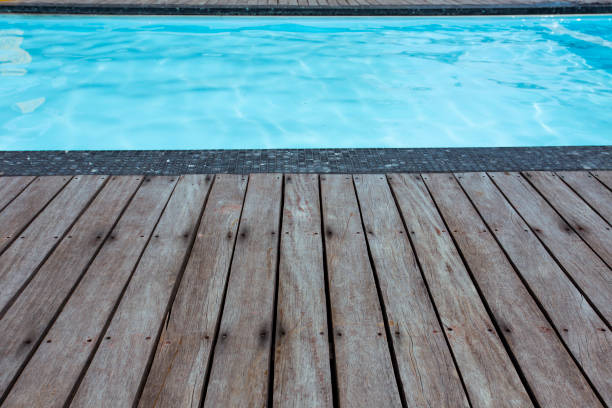istock Blue swimming pool with summer vacation and wooden deck 652116222