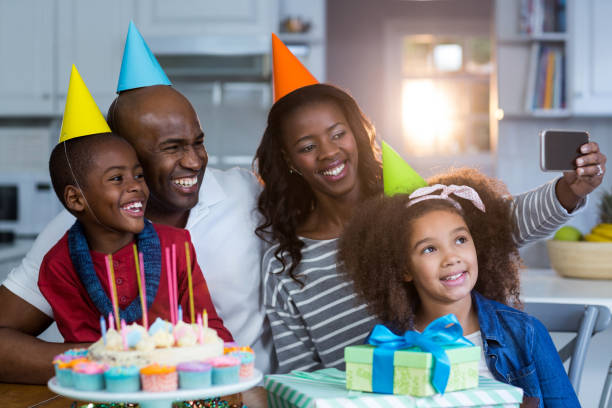 istock Family taking selfie with birthday cake 652118624