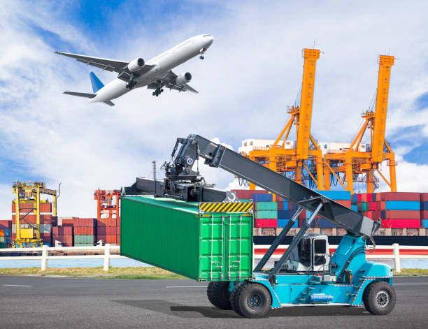 istock Cargo truck lifts container with plane for logistic import export 652122480