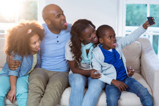 istock Family taking selfie from mobile phone 652127408