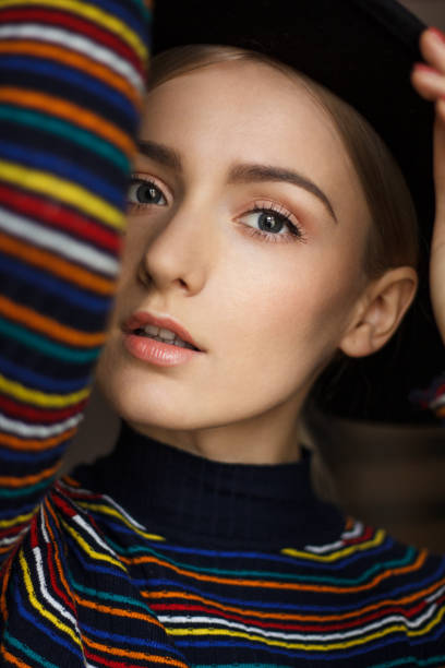 istock Beautiful woman with stripes on the sweater 652130780