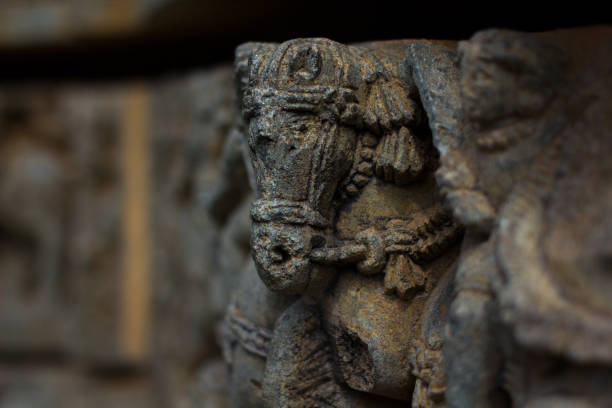 horse sculpture under eves on shrine outer wall in the chennakesava temple at somanathapura, karnataka, india, asia - somnathpur imagens e fotografias de stock