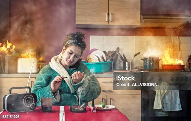 Young Girl Talking Phone Stock Photo - Download Image Now - Kitchen, Fire - Natural Phenomenon, Humor