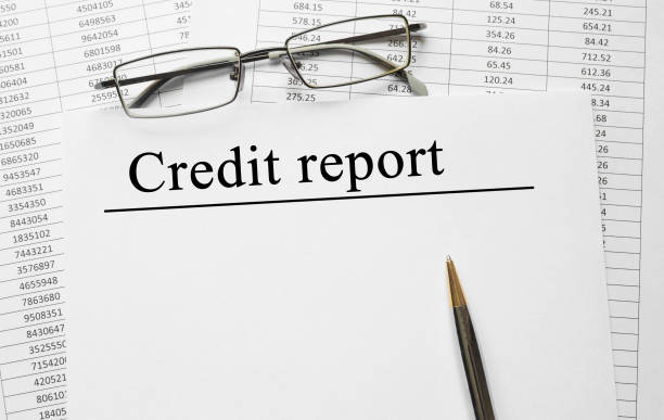 istock Paper with Credit report on a table 652158950