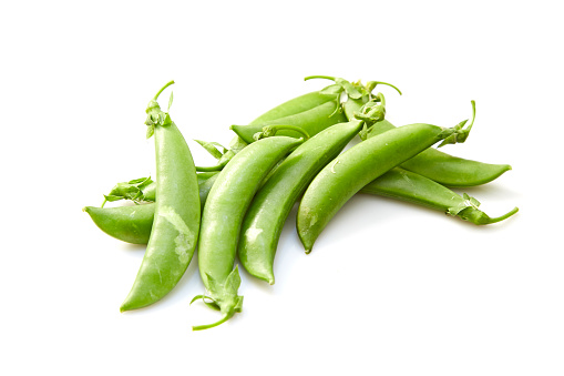 Snow peas isolated over white background