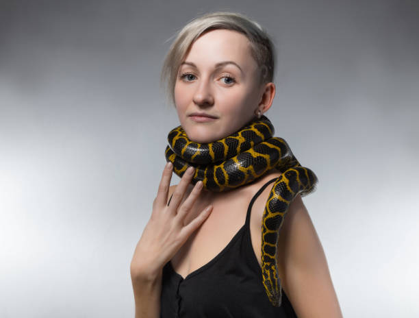 istock Woman and snake on her neck 652161892