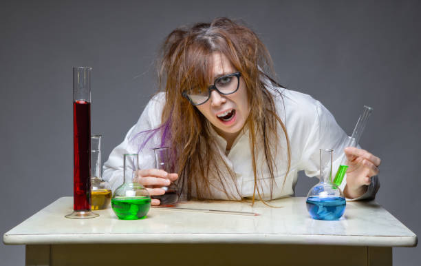 istock Surprised scientist with glass flask 652162084