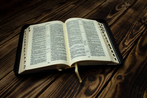 istock Bible on wooden board 652165578