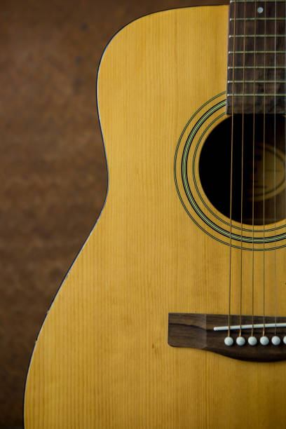istock Acoustic guitar with old steel background 652176984